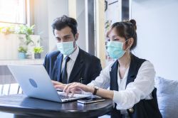 employees working wearing mask