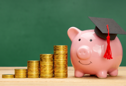 stack of coins with piggy bank